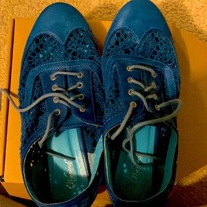 Wanted®️, size 7, blue. Synthetic leather, lace up w/ yarn cutouts & slight heel